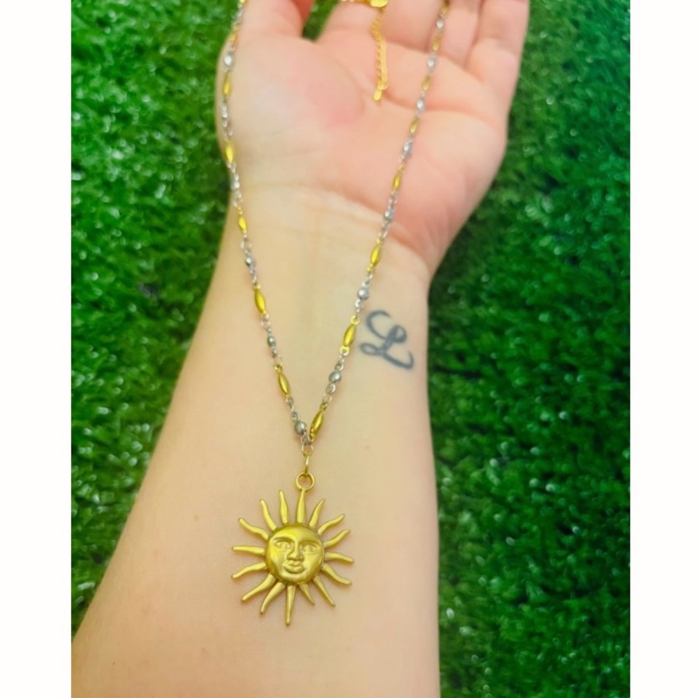 Stainless steel handmade gold and silver necklace with a sun charm. New!